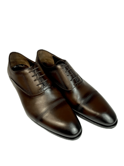 Обувки с нестандартни размери в тъмнокафяво - идеалният избор за елегантни мъже, търсещи комфорт и класа в обувки големи размери.