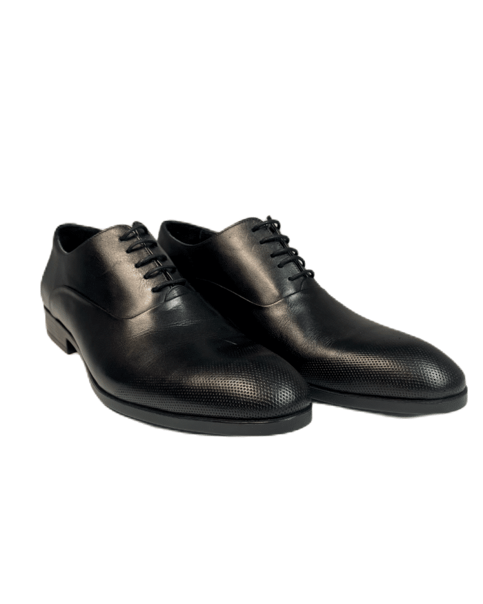 Официални мъжки обувки в класически черен цвят, съчетаващи елегантност и модерен дизайн.