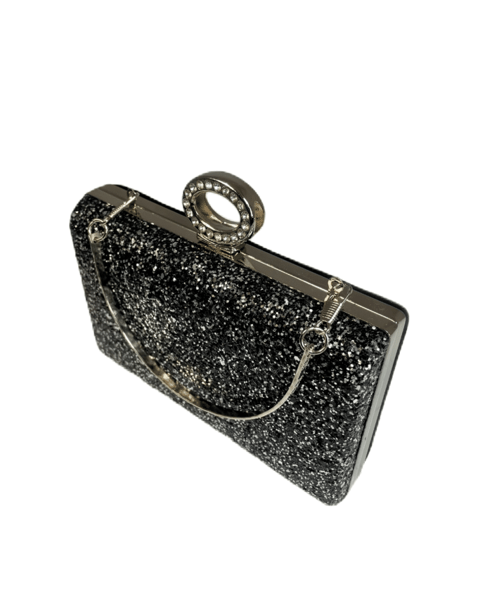 Елегантна официална чанта с брокат, украсена с блестящи акценти и диамантен пръстен като дръжка